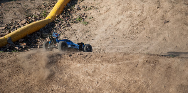 Image of an Associated RC8.2e drifting down a small hill.